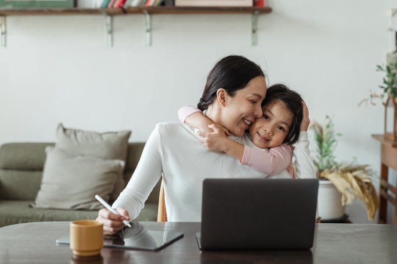 Couple working together from home exploring franchise business ownership opportunities